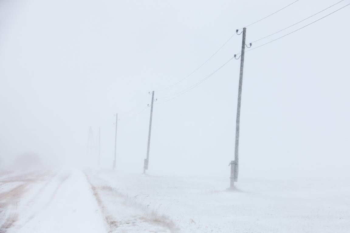 Power lines in a blizzard