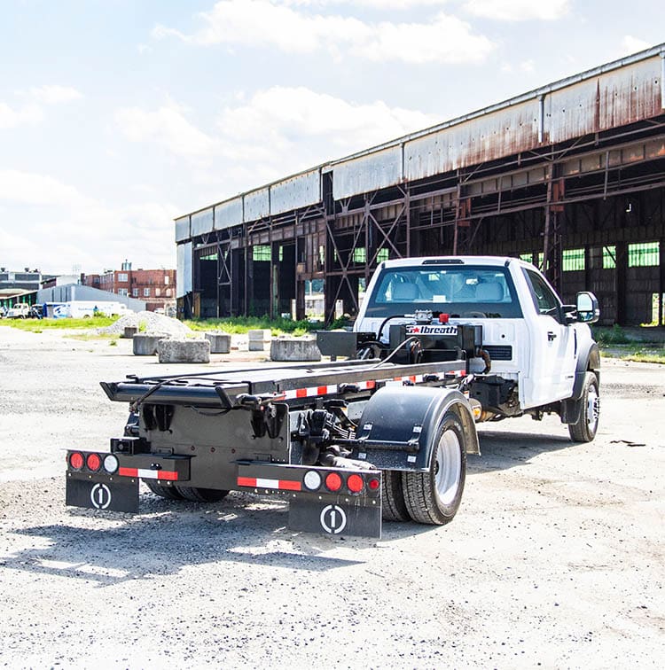Roll-Off Trucks 101: Cable Hoists, Hooklifts & More