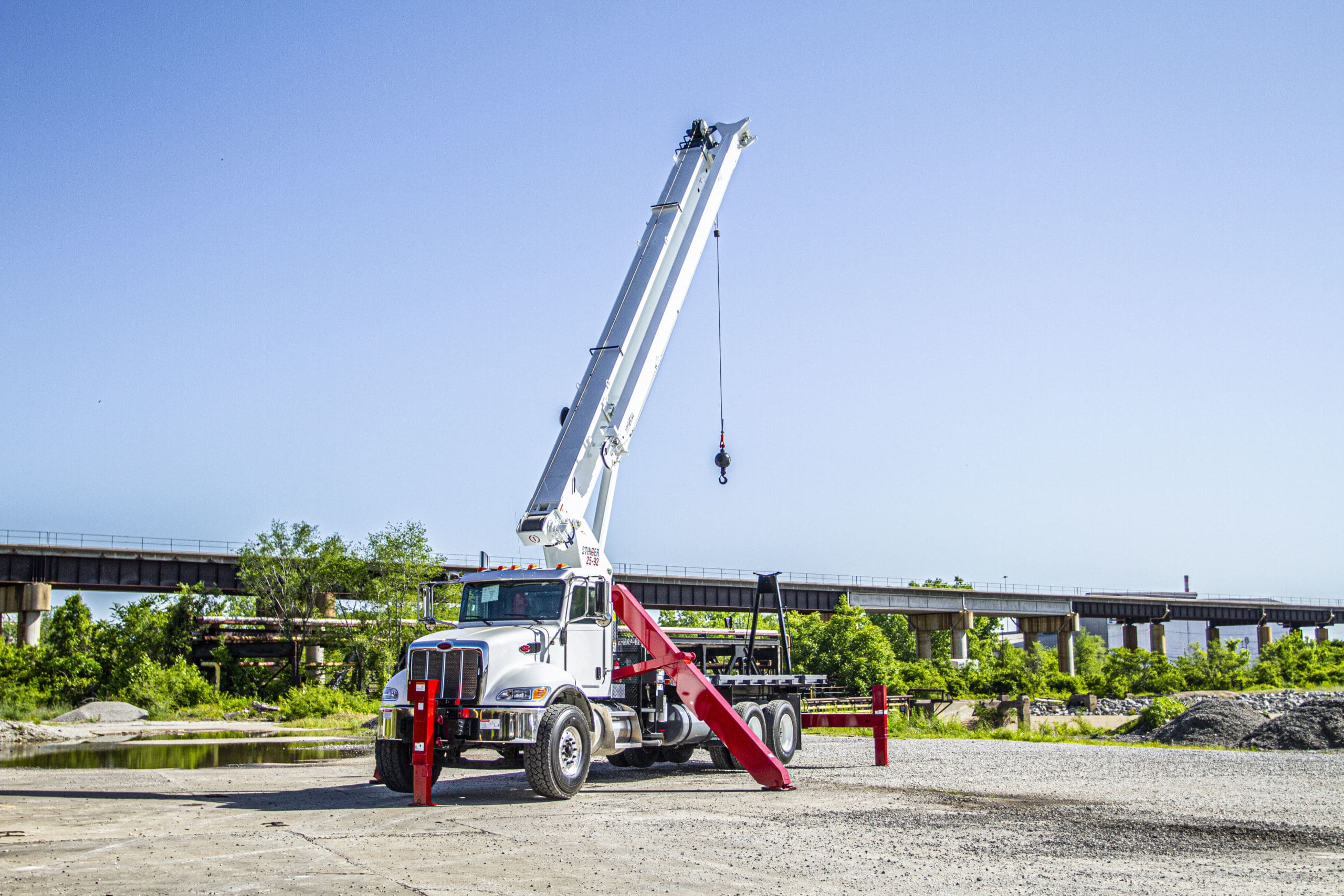 Load King Stinger boom truck, serviceable by authorized service centers