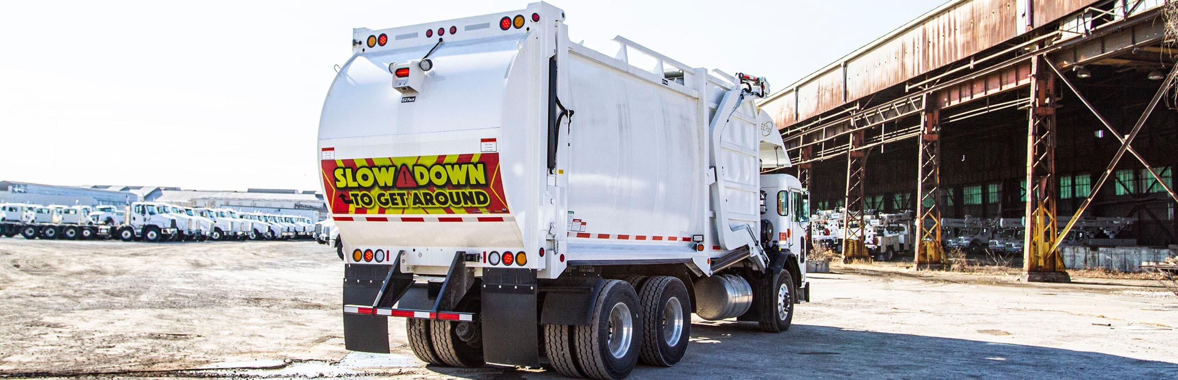 Front-End Loader (FEL) - E-Z Pack Hercules Trash Truck