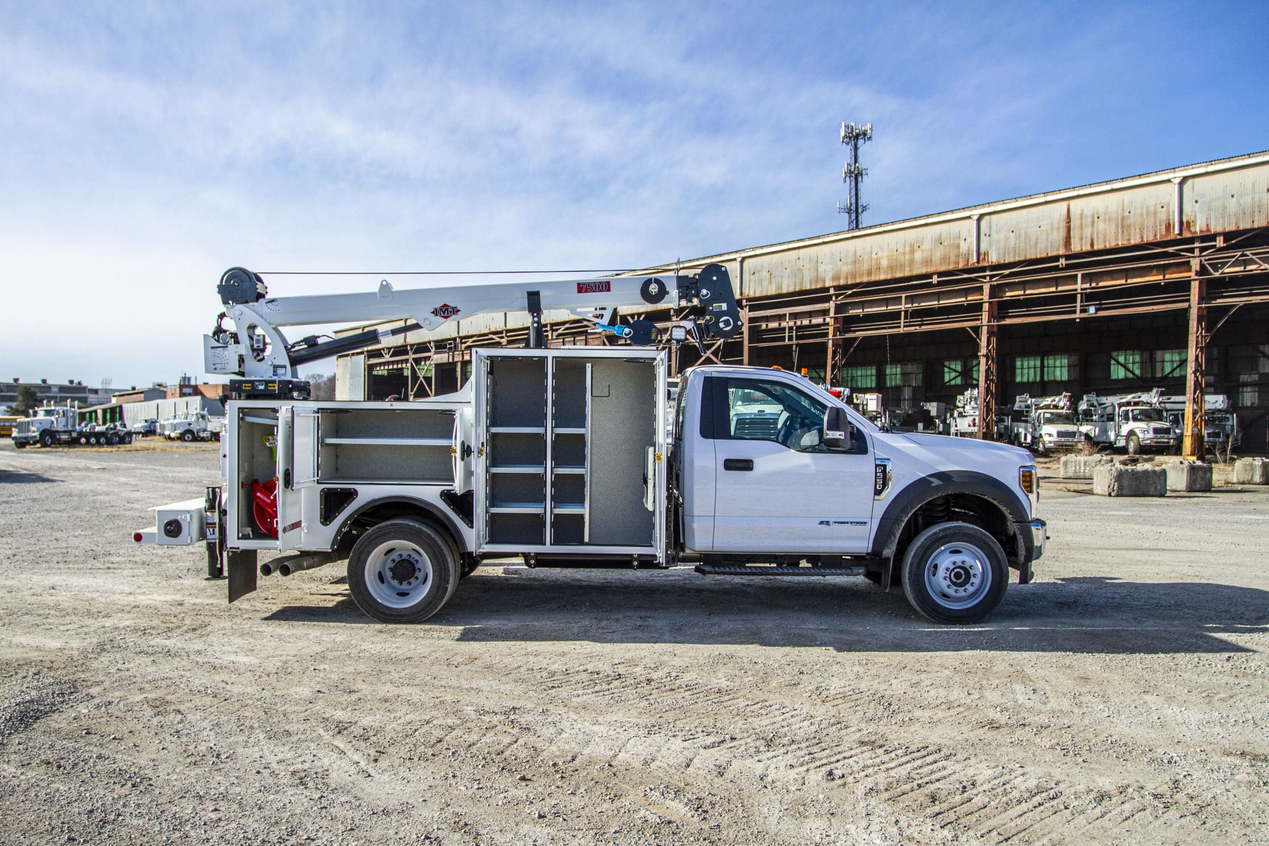 IMT Dominator service truck with its doors open to display how to organize inside shelving