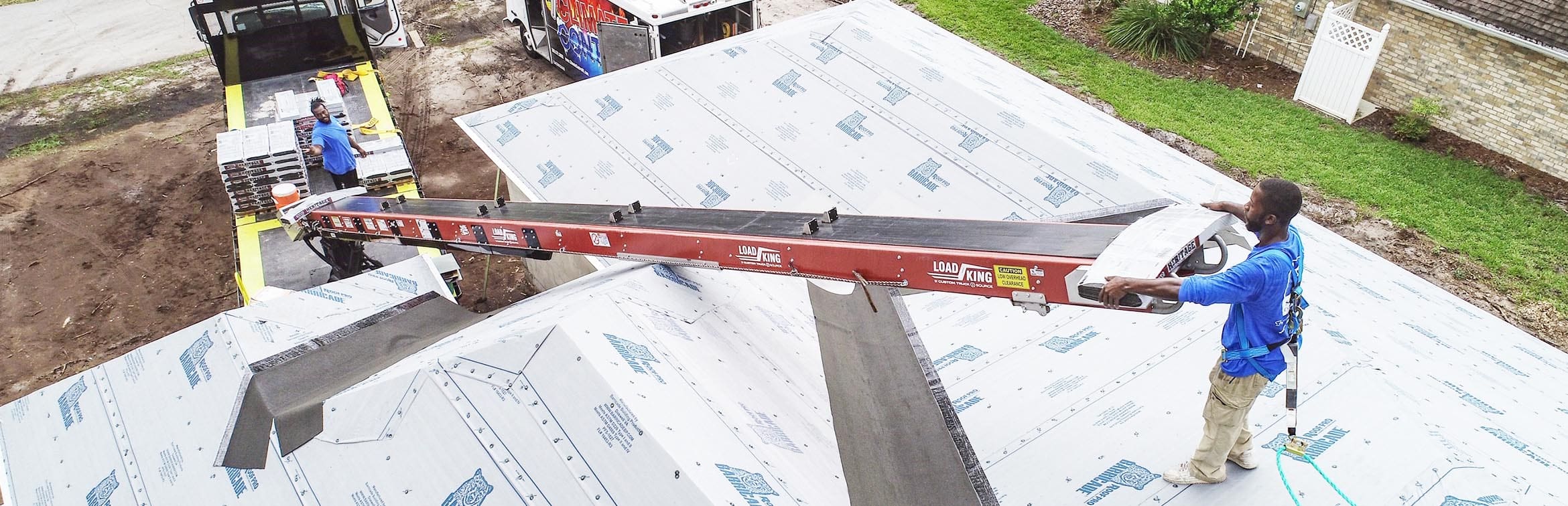 Roofing Conveyors Loading onto Roof