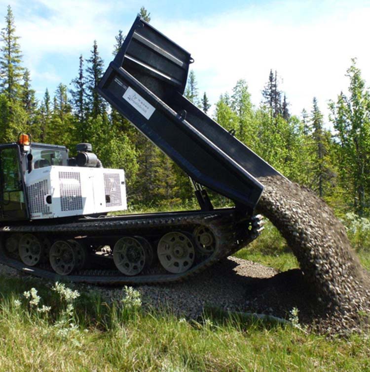 Dumpbed on tracks dumping