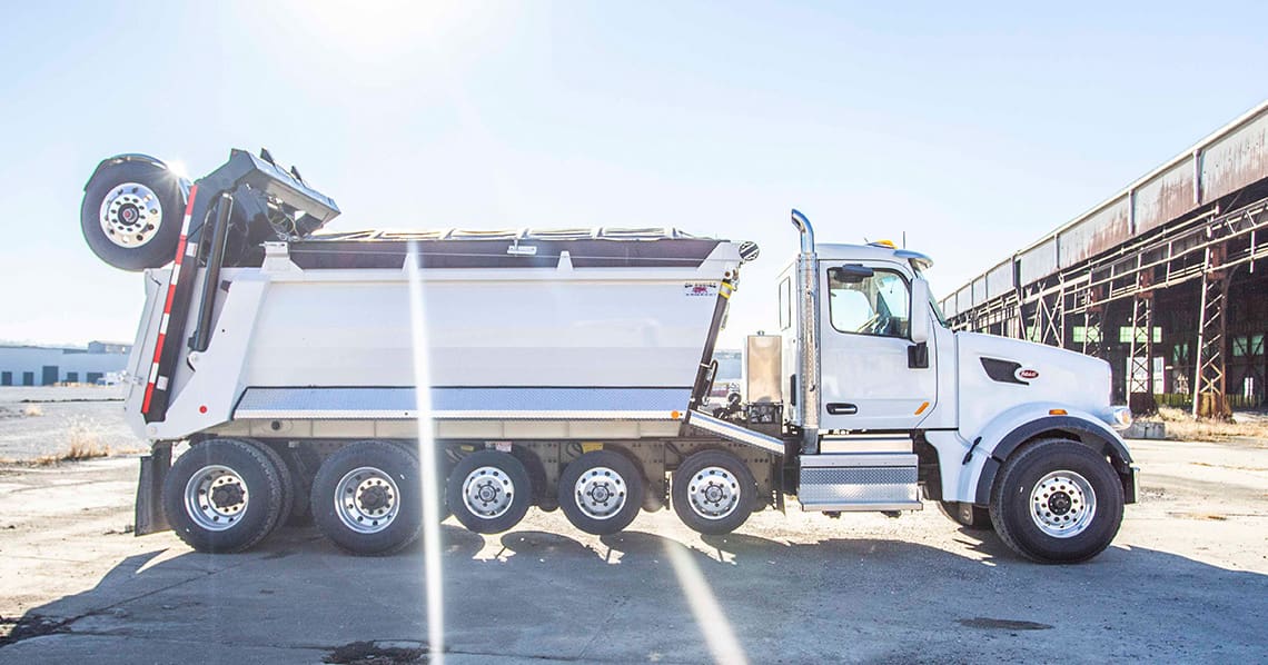 Quad Axle Super Dump on Peterbilt Custom Truck One Source