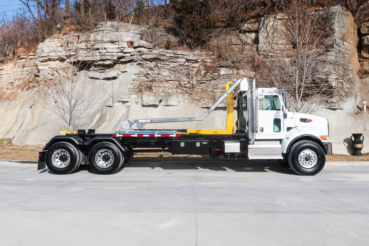 Palfinger T50 hook lift on a Peterbilt 348 chassis