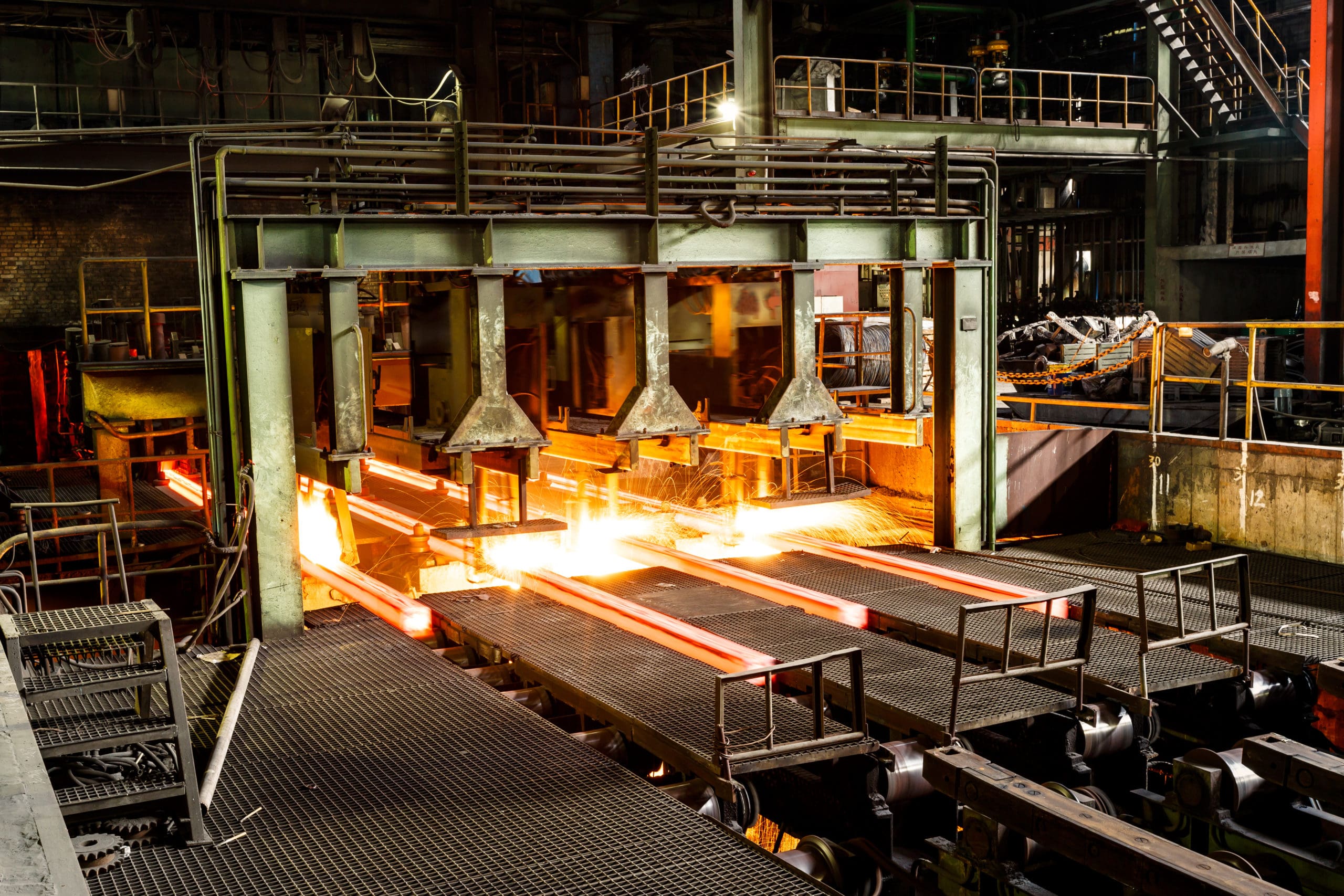 hot steel on conveyor in steel mill