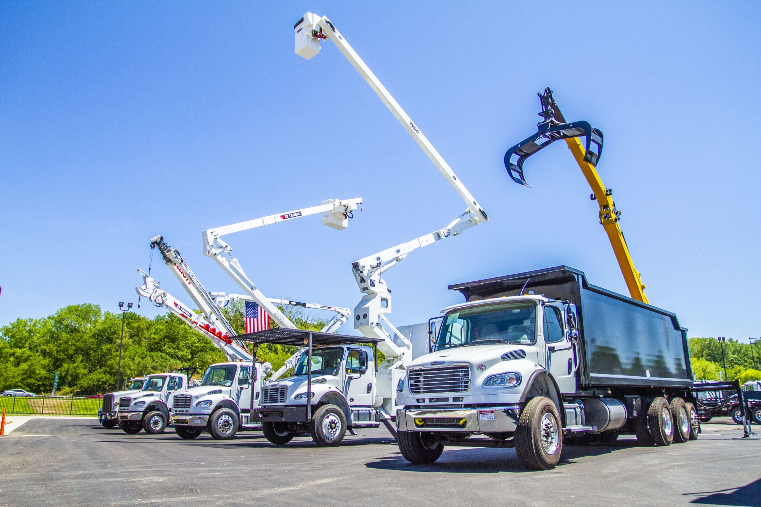 a range of vocational trucks all sold at Custom Truck One Source