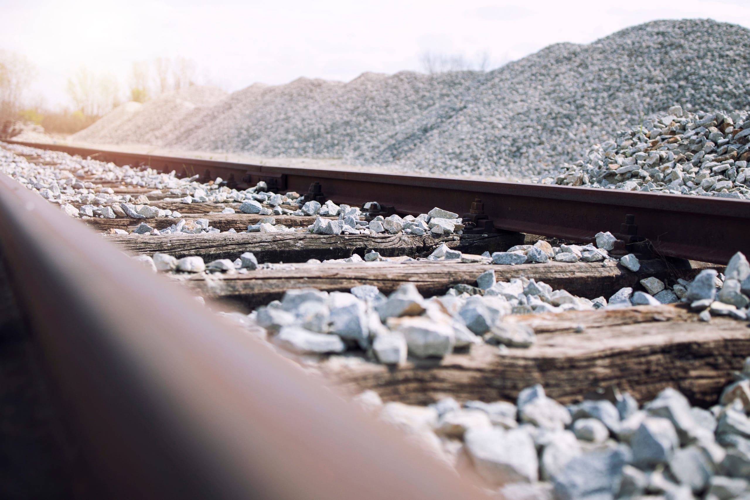 close up of railway ties which require maintenance of way work to upkeep